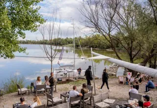 Outdoor tables by the lake