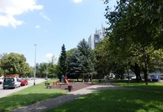 Equipment and benches along the lawn in the Park of the 101st Brigade