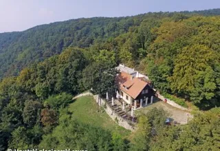 Mountain lodge Glavica surrounded by forest