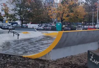 Concrete ramps with yellow edges in Skate Park Špansko